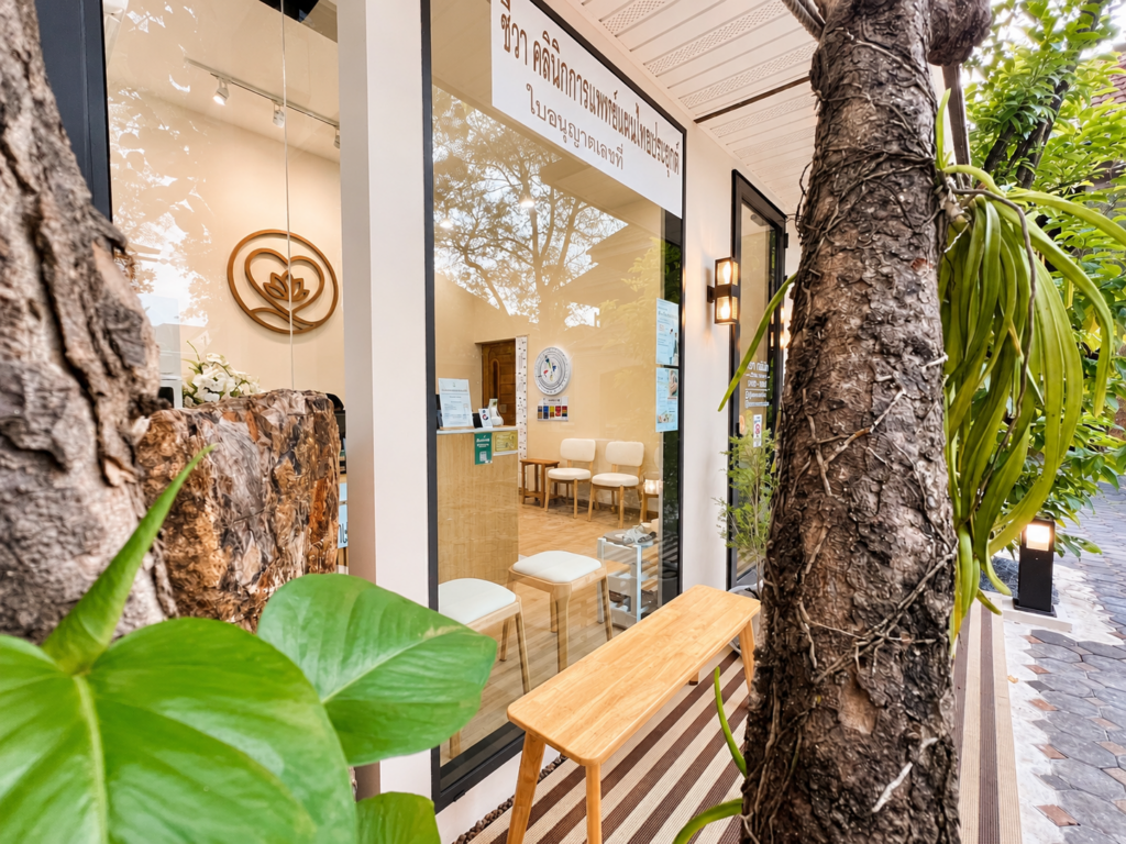 nature framed thai wellness clinic entrance